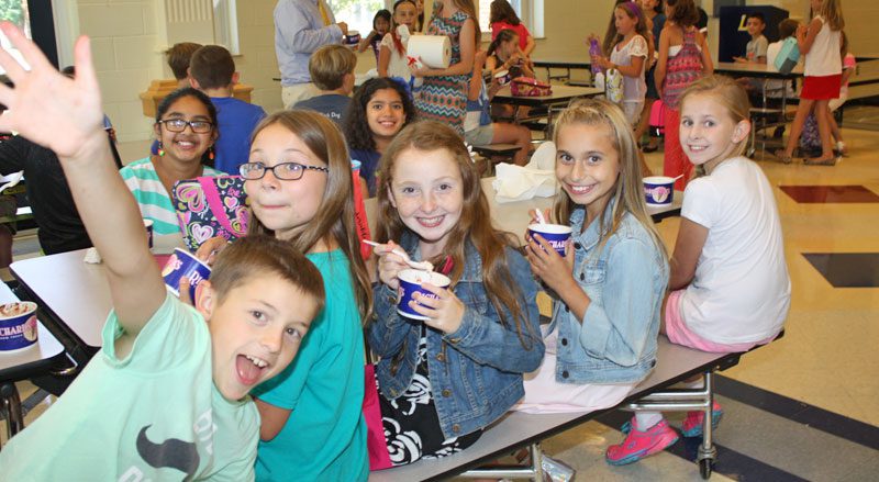 THIS GROUP of fifth-grade friends was very excited about enjoying their ice cream sundaes together on the first day of school at the annual social event sponsored by the Middle School PTO. From left: Josh Simpson, Ava Tardito, Ella Cammarato, Ava Natola and Maggie Davidson. (Maureen Doherty Photo)