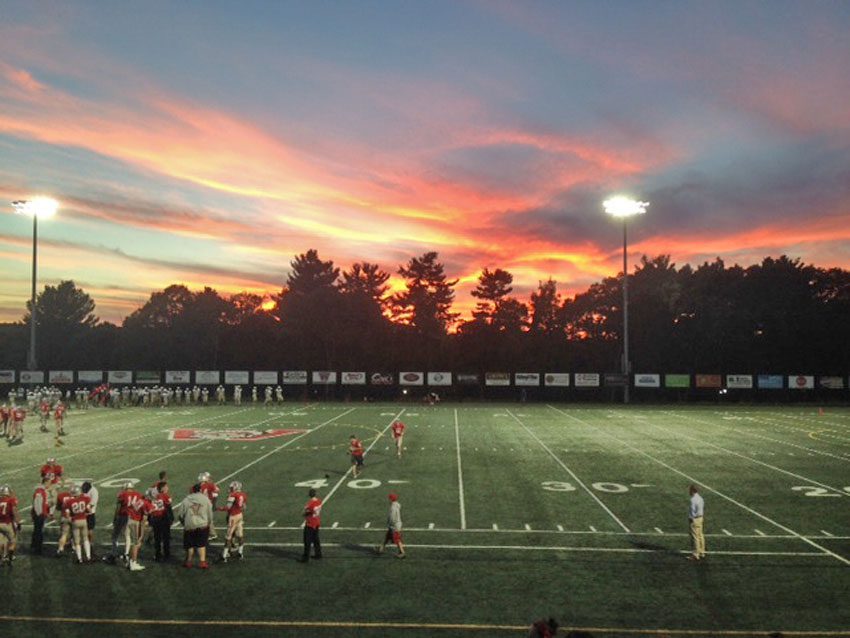 THE SUNSET at the beginning of the Wakefield Memorial High football game on Friday night at Landrigan Field was something to see. The contest itself was a thriller as well. However, the Warriors came up short by a 35-27 score in overtime.