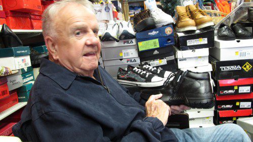 WEST SIDE resident Martin Long found a shoe store close to home where he can buy his favorite shoes at decent prices — E&D Shoes and Workwear at 18 Albion St. (Gail Lowe Photo)