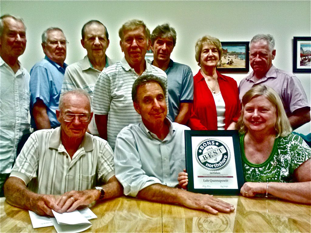 CELEBRATING THE “Best of North Shore” award for “Best Lake” are Friends of Lake Quannapowitt board members. In the front row are Jim Scott, Bill Conley (President) and Leeila Given. In the back row are  Joe Twichell, Jim Murphy, Bill Butler, John Anderson, Doug Mildram, Mary Salois and Ed Spaulding.