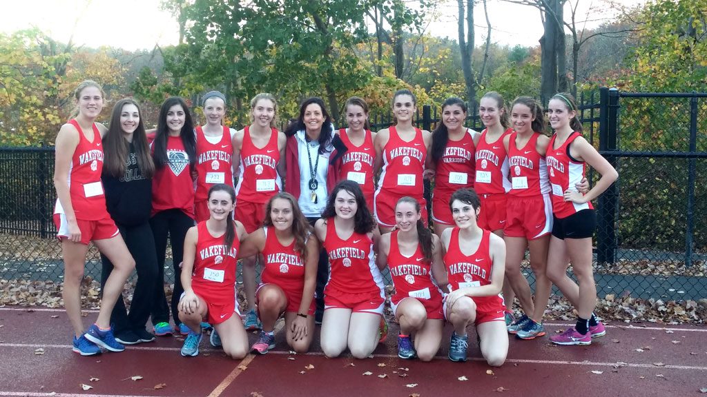 THE WMHS girls’ cross country team captured its fourth consecutive Middlesex League Freedom division championship with a 25-30 victory over Burlington yesterday afternoon at Burlington High School. Wakefield finished with a 5-0 record in the division. Members of the team include Abigail Harrington, Maeve Conway, Reilly McNamara, Sara Custodio, Emily Hammond, Lauren Sallade, Joanna Hammond, Catherine Urbano, Jordan Stackhouse, Hailey Bishop, Gillian Russell, Emmalee Connors, Marissa Pesce, Victoria Popp, Sarah Filleul, Sam Ross and Cubra Umit. The head coach is Karen Barrett. 