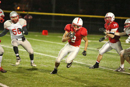 MELROSE SENIOR Christian Pizzotti came up big for the Red Raider Football team, who shutout rival Wakefield in the opening round of the Div. 3 Northwest playoffs, 24-0 last Friday night. Melrose now travels to Woburn to take on the undefeated Tanners this Friday night at 7:00 p.m. (Donna Larsson photo) 