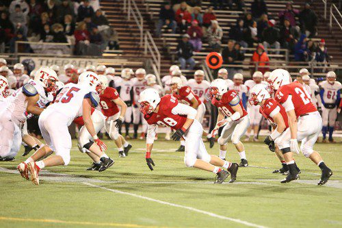 NOBODY WAS getting past Melrose's line during the Red Raider's 14-7 upset victory over defending state champion Tewksbury at the State Semifinals Saturday, which earned Melrose its first trip to Superbowl in 32 years. Not with Raiders Cam Hickey (88), Jack Hickey (34), Brian McLaughlin (19) Ryan Feeney (38) and Zack Mercer (24) on the job. (Donna Larsson photo) 