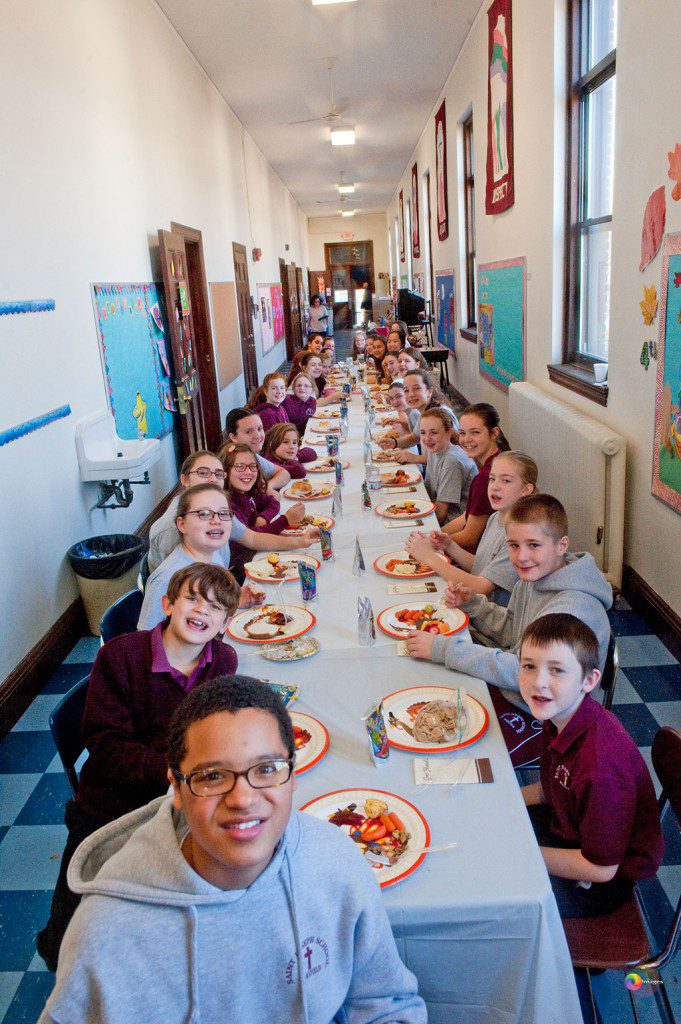 STUDENTS AT ST. JOSEPH SCHOOL enjoyed a delicious holiday meal yesterday. Have a great Thanksgiving. (Photo by cmac Images)