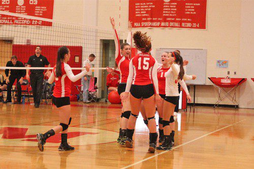 THE MELROSE Lady Raider volleyball team earned their 22nd win and advanced to Div. 2 North semifinals with a 3-1 win over Bishop Fenwick on Tuesday night. (Donna Larsson photo) 