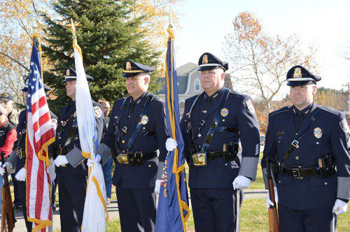 THE NORTH READING POLICE COLOR GUARD proudly shows the colors during Veterans Day on North Reading common. (Bob Turosz Photo)