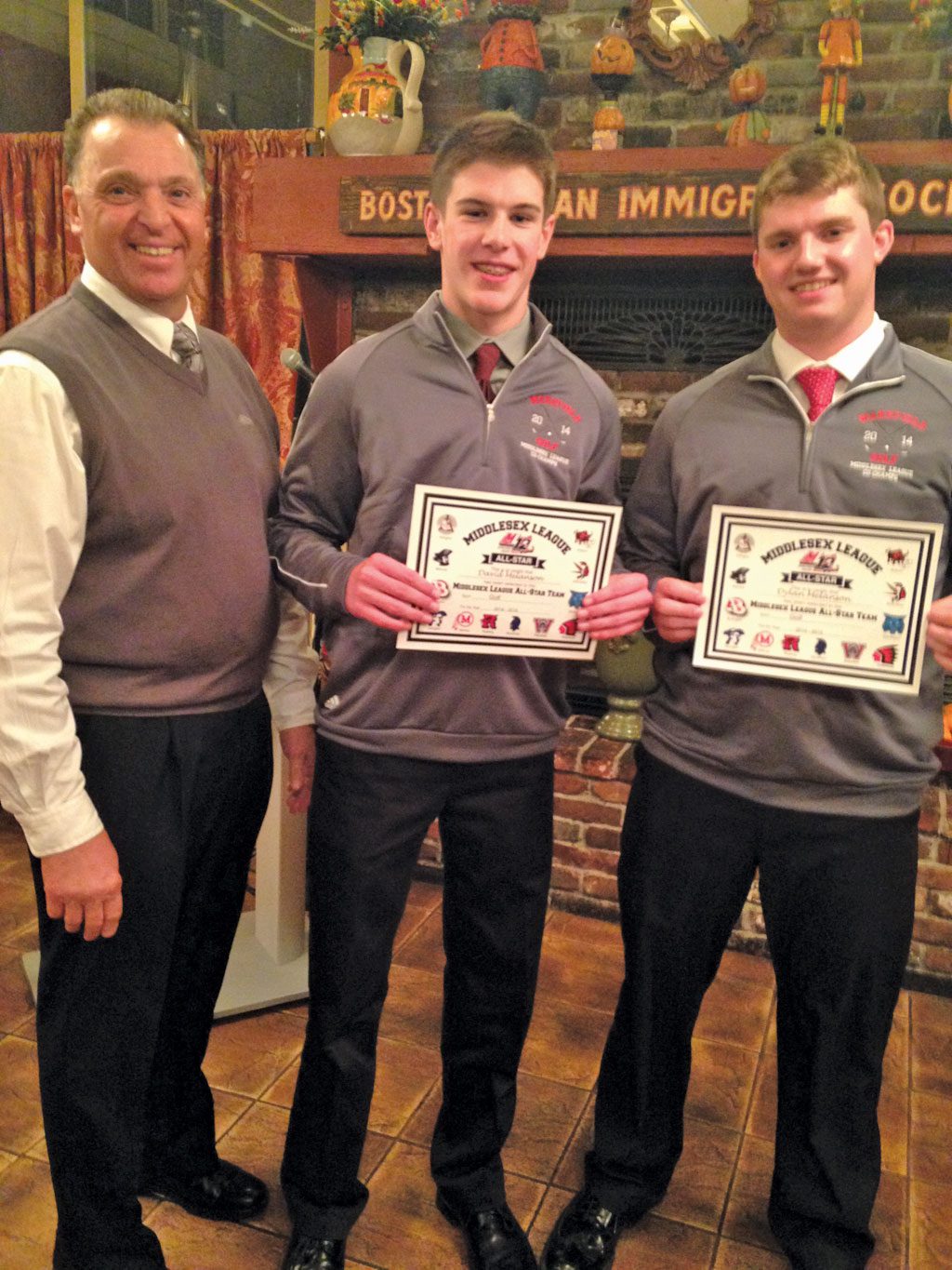WAKEFIELD’S TWO Middlesex League Freedom division all-stars were presented with certificates at the team’s recent banquet. From left to right are Head Coach Dennis Bisso and Middlesex League All-Stars David Melanson and Dylan Melanson.