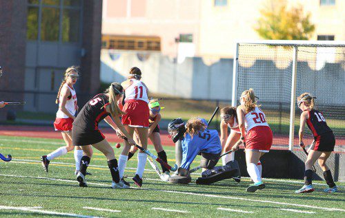 SENIOR GOALIE Miriam Wood (#55) was stellar in the cage all season and was chosen as 2014 Middlesex League Freedom division all-star. Wood was the lone Warrior selected. (Donna Larsson File Photo)