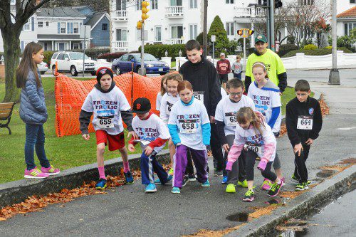 THE RUNNERS for the Frozen Frolic Mile Kids’ Fun Run line up for the start of the race on Saturday. (Colleen Riley Photo)