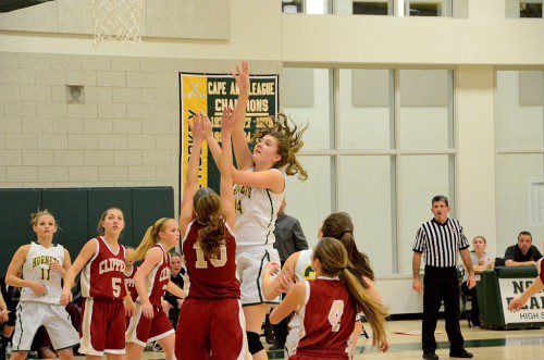 HISTORIC POINTS. Hornet junior Jess Lezon scores the first varsity points in the new high school gymnasium in last week's Lady Hornet victory over the Newburyport Clippers. Lezon led all Hornet scorers with 21 points. (John Friberg Photo)