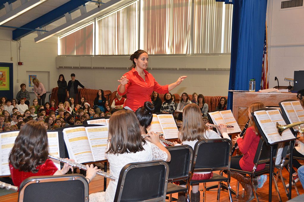 THE BEGINNING BAND, led by music teacher Kristen Dye, performed “Hot Cross Buns” and other holiday favorites at the Hood School’s Winter Concert this week. (Bob Turosz Photo)