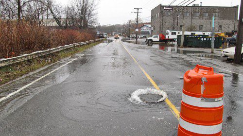 NEW Salem Street was closed off to traffic this morning following a nor’easter yesterday that dumped more than four inches of rain in the area. (Gail Lowe Photo)