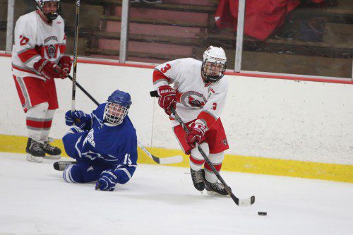 ZACH SALAMONE, a senior forward (#3), scored Wakefield’s lone goal yesterday against Lynnfield. In the back is junior defenseman Steven Melanson (#27). The Warriors and Pioneers played to a 1-1 tie in the consolation game of the South Division in the Kasabuski Christmas Tournament.  (Donna Larsson File Photo)