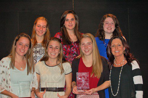 A NUMBER of awards were presented at the recent WMHS girls’ cross country banquet. In the front row (from left to right) are award recipients Emily Hammond (Top Runner Award), Lauren Sallade (Coaches Award) and Reilly McNamara (Most Improved Award) and Head Coach Karen Barrett. In the back row (left to right) are award recipients Abby Harrington (Lady Wolverine Award), Sara Custodio (Unsung Hero Award) and Maeve Conway (No Guts, No Glory Award).