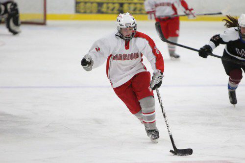 SENIOR FORWARD and captain Meghan Guarino was Wakefield’s leading scorer a year ago. She returns to lead the Warrior offense this season as the girls’ hockey teams seek to have an improved winter campaign. (Donna Larsson File Photo)