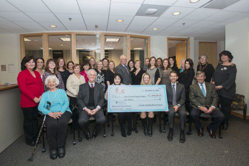 AN AMAZING milestone was achieved by Friends Fighting Breast Cancer (FFBC) when the all-volunteer non-profit reached its goal of donating $1 million in total giving to breast cancer research at Mass. General Boston. Celebrating the milestone with doctors from the Cancer Center were many past and present members. Front row, from left: Mary Gritti, Dr. Jerry Younger, co-founder Fran Gilardi, chairperson Katie O’Neill Britton, Dr. Leif Ellisen, Dr. Bruce Chabner; middle row, from left: Joanne Tenaglia, Danielle Tenaglia, Maureen Doherty, Julie Connolly O’Neill, Anne Fields, Barbara Rodrigues, Joanne Connolly Leach, Kara Kieran, Michael O’Neill, Debbie Burke, Stephanie Aguiar, Elizabeth Stone, Kate Sullivan Marr, Davi-Ellen Chabner, Theresa Gritti; back row, from left: Helen O’Carroll, Brenda Sutherland, Lori Pelletier, Karen Karim, Katelyn Kerrigan, Jenna Stone, Kristin Quinn and Mary Donald. (MGH Photo)