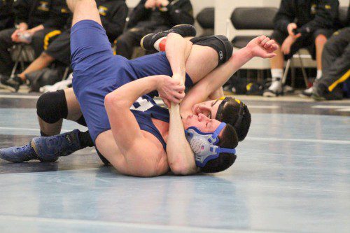 SENIOR Garrett Anderson (at left) improved his dual meet record this season to 6-0 after pinning his Peabody opponent in 2:15 in the 145 lbs. weight class on Jan. 23. Anderson has won all of his matches this season by pin. The Black and Gold defeated Peabody 45-6.  (Courtesy Photo)