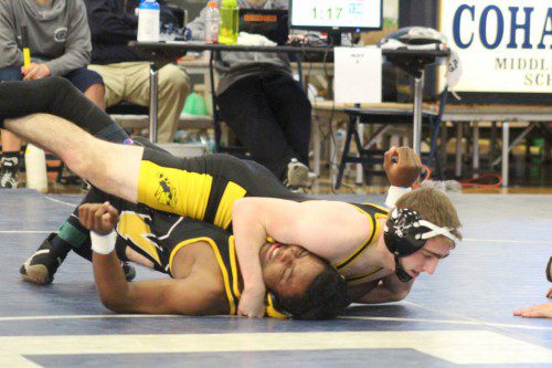SENIOR CAPTAIN Lucas Pascucci (on top) placed first in the 138 lbs. weight class during the Cohasset Tournament on Jan. 10. Pascucci won the 132 lbs. weight class during last year’s Cohasset Tournament. (Courtesy Photo)
