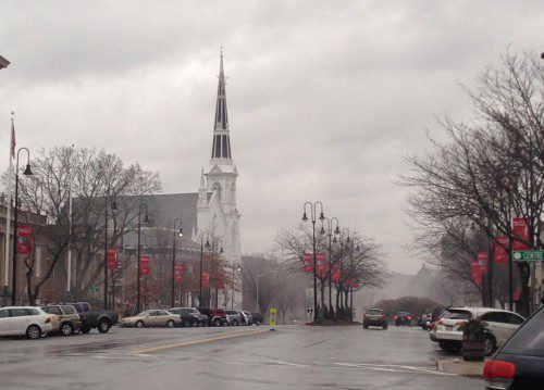 DOWNTOWN WAKEFIELD takes on a much different look when fog begins rolling in off Lake Quannapowitt, like it did yesterday. (Donna Larsson Photo) 