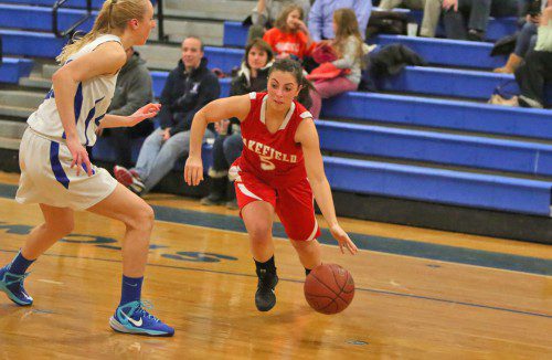 NICOLE GALLI, a senior point guard (right), scored eight points including a perfect 4-for-4 from the free throw line. Wakefield, however, came up short of a victory as it dropped a one point decision against Burlington, 47-46. (Donna Larsson File Photo)