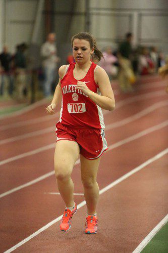 MEGHAN CHAPMAN, a senior, captured first place in the 1000 meter run in a time of 3:20.20 and helped Wakefield’s 4x400 relay to a first place finish as well. (Donna Larsson Photo)