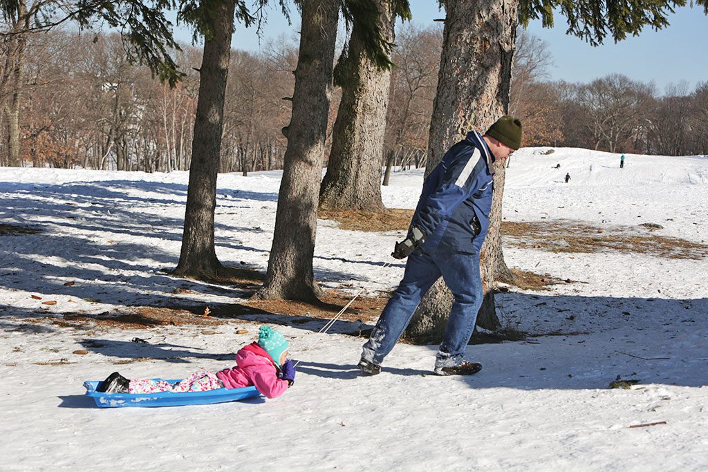 JOHN WHEATLEY and his 5-year-old daughter Scarlett had quite a time at the winter wonderland known as Mount Hood Park and Golf Course recently. (Donna Larsson Photo)