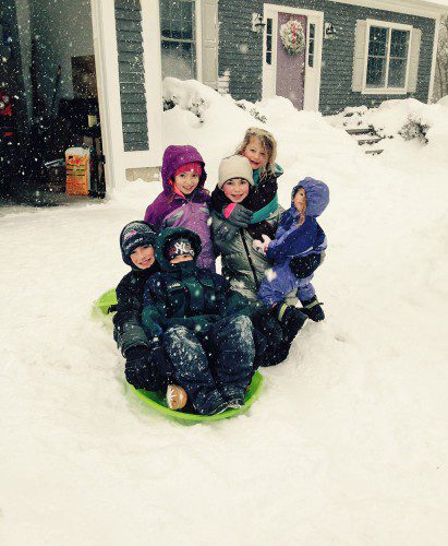 THE STRINGER and Demirbilek families enjoyed sledding and other fun during last week's blizzard. Front: John and Ryan Stringer. Rear: Stephanie and Carly Stringer, Layla and Chloe Demirbilek. (Courtesy Photo)