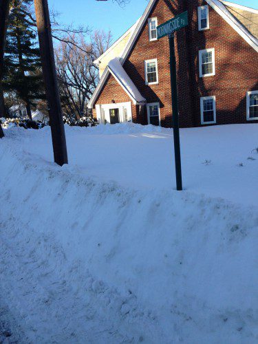 THIS MORNINGSIDE ROAD home is fenced in by a white wall of snow. (Sandy Panico Photo)