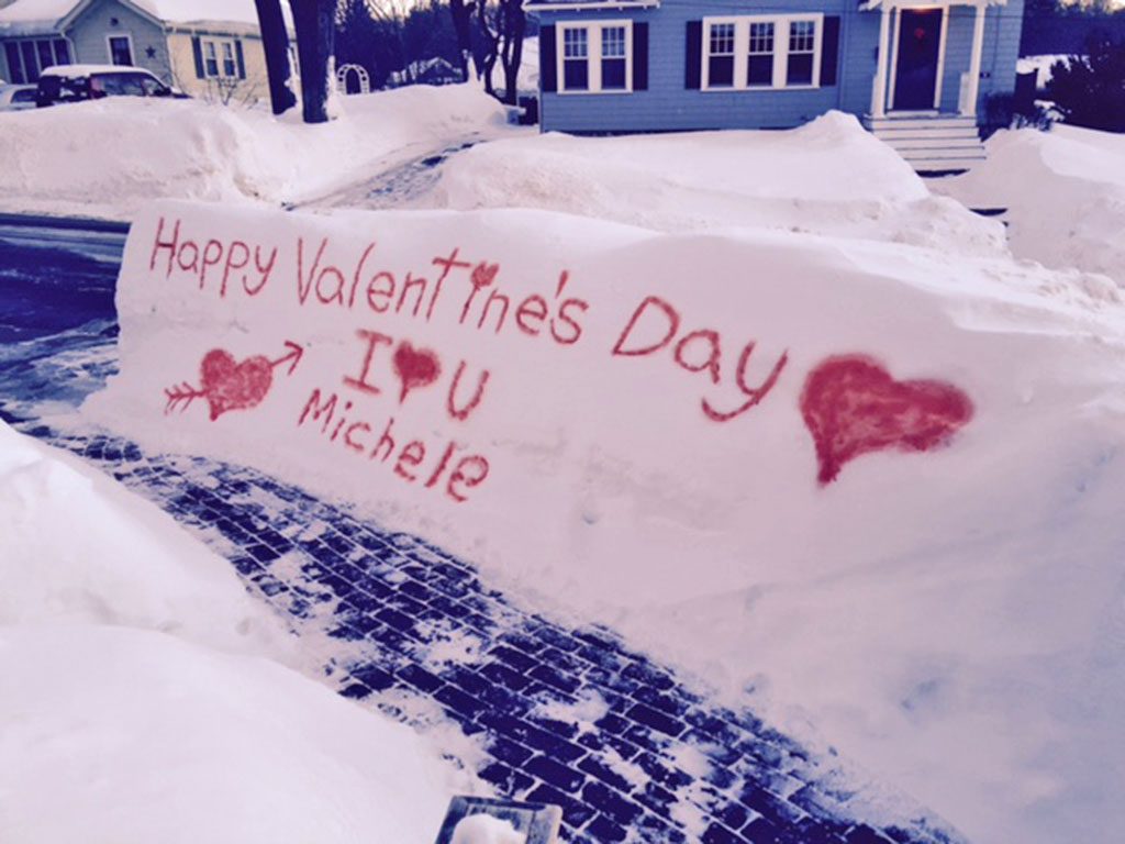 MATTHEW SCHERI, a Galvin Middle School custodian, lives on Lawrence Road in Reading and made this message in the snow for his wife Michele to see when she got home from a long day’s work.