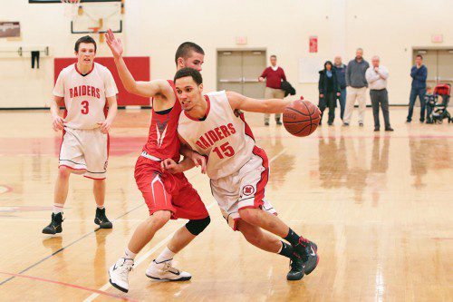 ANTHONY GILARDI and Colby Andrews (#3) helped fuel a must-win over Wakefield last week that lifted the Melrose Red Raider hoop team to playoffs. But on Monday, the Raiders fell to Gloucester in the first round of the Div. 2 North playoffs. (Donna Larsson photo)