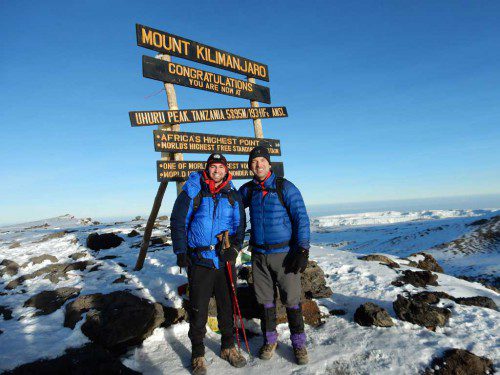 WAKEFIELD NATIVE Dr. Paul A. Willett (WHS ‘82), son of Anne and Alfred Willett, with his son, Spencer, recently participated in a 16-day expedition to Tanzania, Africa and summited Mt. Kilimanjaro. The 19,431 foot summit is the tallest free-standing mountain in the world and the highest peak in Africa. The adventure included local exploration for developing a medical mission while enjoying the abundant wildlife of the great migration in the Serengeti, Ngorongoro Crater and Tarangire National Park.