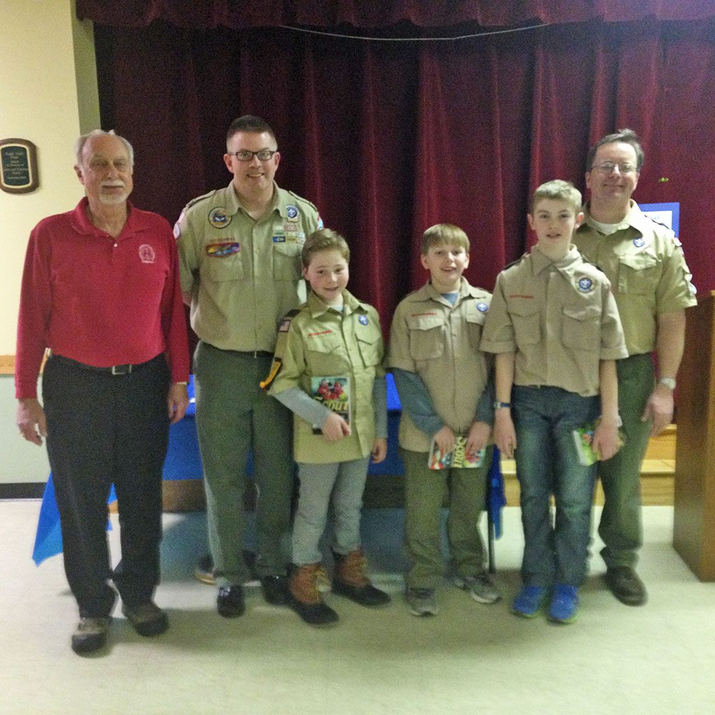THREE Lynnfield Pack 48 Cub Scouts earned the Arrow of Light Award, the highest rank in Cub Scouts, and have crossed over to Boy Scout Troop 48. To earn this award, the scouts completed requirements in citizenship, fitness, outdoor and survival skills and first aid as well as elective requirements such as engineering, sports, scholarship and nature. From left: Rev. Dr. Dennis Bailey, Scoutmaster Gordon Forrest, Jacob MacPherson, Samuel Wehle, Lucas Williams and Cubmaster of Pack 48 Mike Wehle. (Courtesy Photo)