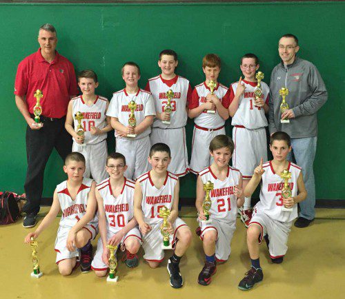 THE WAKEFIELD Boys’ Sixth Grade Travel Basketball B team won it all in its age group after an impressive 53-35 win over Lexington in its final game. The team played great and it was one of the few games where every player put points up on the scoreboard. In the front row are Matt Wilkinson, Aidan Lynch, John Bennett, Brendan McCarthy and Jacob Barrett. In the back row are Coach Jed Barrett, Aidan Bright, Evan McGonagle, Matt McKean, Dan King, Charlie Shea and Coach Matt Shea. Teammates not pictured are Malcolm Burns and Kenny Vaughn.