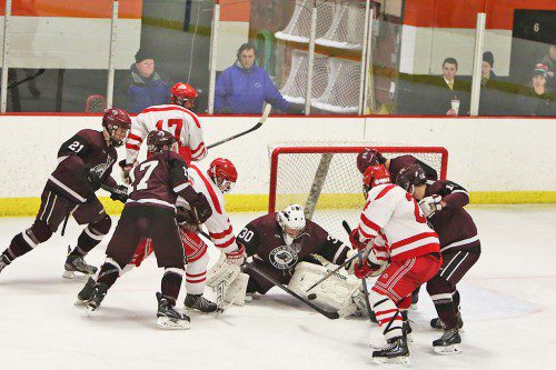 THE MELROSE Red Raider hockey team fell in the opening round of Div. 1 North playoffs in a heartbreaking 2-1 overtime loss to Chelmsford. (Donna Larsson photo)