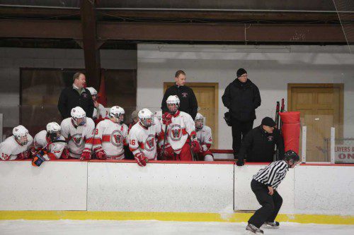 THE WMHS boys' hockey team had a new coaching staff in place, led by John Pellerin (coach standing on the far left).The Warriors showed improvement during the 2014-15 season. (Donna Larsson Photo)