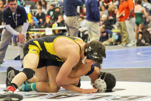 JUNIOR Max Whyman (on top) was only one win away from placing in the 126 lbs. weight class during the All State Tournament at Salem High School on Feb. 27 and 28. Whyman defeated Lawrence’s Victor Guzman by a 4-0 decision in the first consolation round at the All State Tournament. (Courtesy Photo)