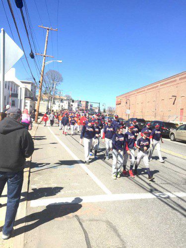 THE WAKEFIELD Little League opening day parade was held on Saturday morning as baseball and softball players marched from the Common down Main Street and Water Street to Fernald Field. After the parade and opening ceremonies, games were played to begin the season.  (Keith Curtis Photo) 