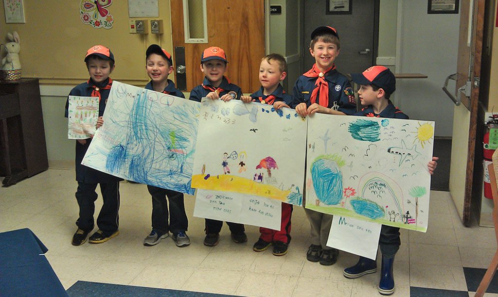 THE GOLDEN LIVING CENTER-MELROSE, located at 40 Martin St., celebrated National Volunteer Week recently. Residents hosted a visit by Melrose Cub Scout Troop 10 and troop leader Van Caldewell. Everyone shared smiles and the scouts presented residents with some of their personalized art work.