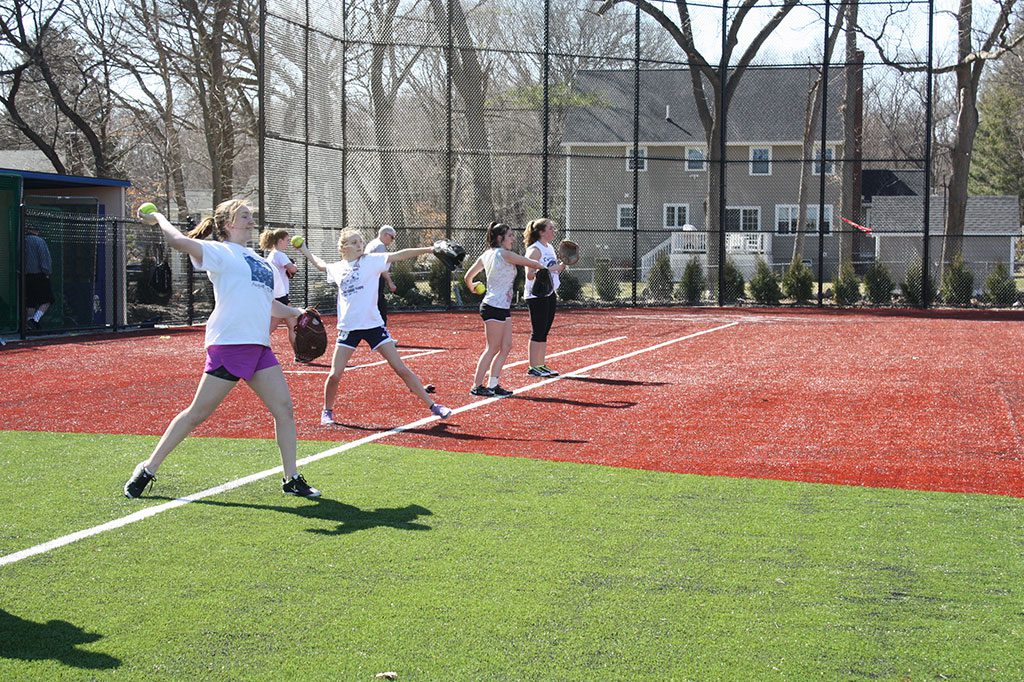MEMBERS of the varsity softball team are excited to be breaking in their brand new state of the art turf field at the high school, soon to be a showpiece in the Cape Ann League. (Maureen Doherty Photo)
