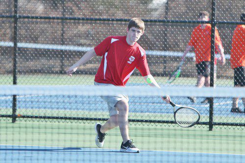ADAM HAMMOND, a senior, returns this spring and has moved from third singles to first singles to lead the Warrior boys’ tennis team. (Donna Larsson File Photo)