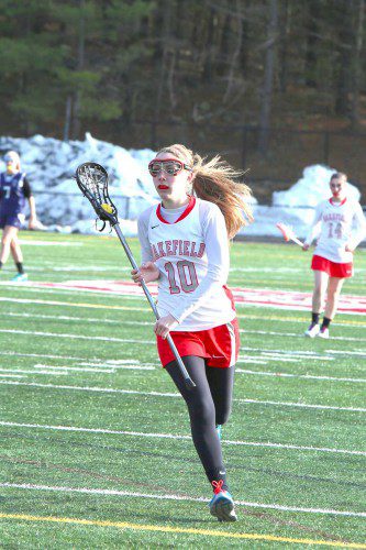 JULIANNE BOURQUE, a junior, scored a goal and earned an assist in Wakefield’s win against Arlington yesterday at Landrigan Field. On Tuesday against Medford, Bourque scored three goals and had two assists. (Donna Larsson File Photo)