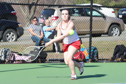 SARAH STUMPF, a junior, posted a 6-3, 6-4 victory at second singles against Watertown’s Sarah Rahim. The Warriors blanked the Red Raiders, 5-0, yesterday afternoon at the Dobbins Courts.  (Donna Larsson Photo) 