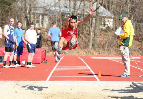 JIAN Glen Gallardo had a terrific jump of 20-0 to take second in the long jump behind teammate Pat Casaletto’s winning leap of 20-9. Gallardo qualified for states with the distance. (Donna Larsson Photo)