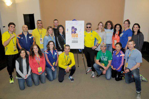 MORE THAN 20 runners proudly honored the history and legacy of the Armenian Genocide in the 119th Boston Marathon. In the front row (from left to right) are Laurie Nahigian of Watertown, Kristen Murphy of Lynnfield, Nicole Arpiarian of Sudbury, Apo Ashjian of Belmont, Mike Donabedian of Vancouver, Wash., Christine Donabedian of Vancouver, Canada, and Pat Lanagan of Newton. In the back row (from left to right) are Shant Hagopian of Los Angeles, Calif.; Tommy Tomasian of South Boston; Sarkis Chekijian of Belmont, Mary Demers of Uxbridge, Talia LaPointe of Jefferson, Roupen Bastajian of Greenville, R.I., Steven Najarian of Belmont, Cera Adams of Brighton, Jennifer Sahatjian of Woburn, Jenny Konjoian of Andover, Suzie Oliviera of Wakefield and Marie Castle of Danvers. Participants not in the photo are: Mike Hovagimian of Hopkinton and Debbie Gilligan of Lowell.  (Jim Walker/Conventures, Inc. Photo)