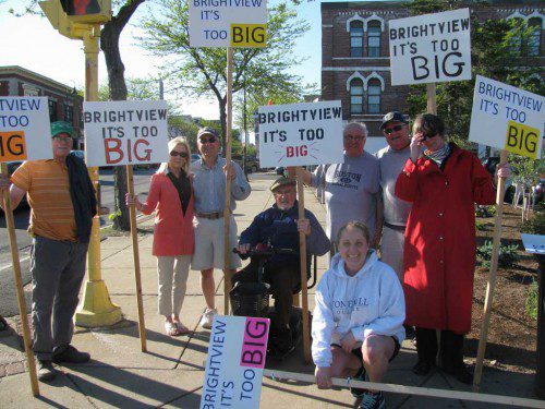 PROTESTERS of the Brightview Senior Living facility marched up and down Main Street before the Zoning Board of Appeals met at Town Hall to continue discussions about the project. From left: Stan Kolinsky, Eaton Street; Ann Fandel, Crescent Street; Patrick Bruno, Mackenzie Lane; Horace Sheldon, Eaton Street; Don Cook, Jessica Lane; Erin Cook, Jessica Lane; Fred Rich LaRiccia, Franklin Street and Kristen Henshaw, Pierce Avenue.
