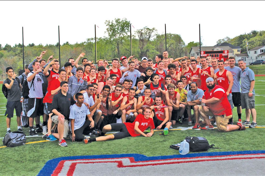 THE WMHS boys' outdoor track team captured the Middlesex League Freedom division title yesterday with a 71-65 triumph over Burington. It is the first outdoor title for the Warrior boys' track team since 1973.