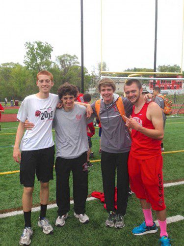 THE 4x800 meter relay team  broke the school record and won the Div 3 title with a time of 8:03.69. From left to right are Ian Ritchie, Adam Roberto, Alec Rodgers and Jackson Gallagher. The record was previously held by Aaron Lucci, Rodgers, Pat Scheeler and Ritchie.  
