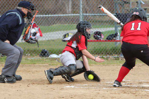 CATCHER NICOLE Catino makes a block behind the plate during a recent game. Catino had a hit, scored a run and drove in a run in Wakefield’s 9-2 victory over Stoneham on Friday night at Vets’ Field. (Donna Larsson File Photo)