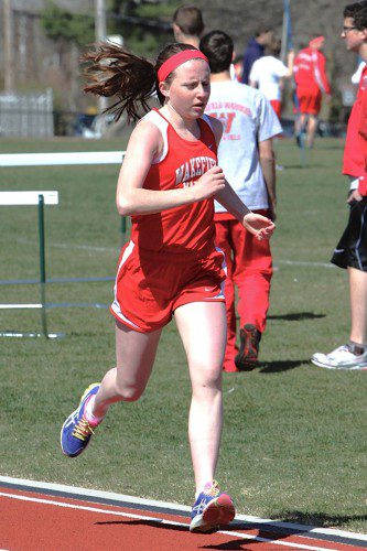 SHANNON QUIRK was crowned the Middlesex League champion in the two mile as she posted a winning time of 11:27.30 yesterday in the M.L. 12 Track and Field championship meet. (Donna Larsson File Photo)