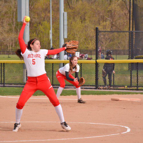 THE MELROSE girls varsity softball fell just shy of a major comeback after a last inning revival that ultimately ended in a 3-2 loss to Burlington in the opening round of playoffs. Pictured is Melrose hurler Alex McGuire. (Steve Karampalas photo) 